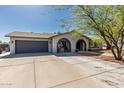 Well-maintained single-Gathering home featuring a spacious driveway and attached two-car garage at 3061 W Betty Elyse Ln, Phoenix, AZ 85053