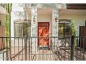 Inviting front door with iron gate, desert landscaping, and address displayed at 3150 E Beardsley Rd # 1081, Phoenix, AZ 85050