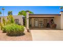 Inviting home with a well-maintained exterior, drought tolerant landscaping, and a convenient covered parking at 1951 E Del Sur Dr, Tempe, AZ 85283
