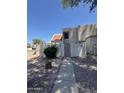 Desert home with stucco exterior and a charming gated courtyard at 1342 W Emerald Ave # 373, Mesa, AZ 85202