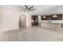 Open-concept layout seamlessly connects the living room to the kitchen area, perfect for modern living at 3948 E Caitlin Dr, San Tan Valley, AZ 85140