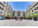 Exterior courtyard with fountain and manicured landscaping under a clear sky at 6803 E Main St # 5506, Scottsdale, AZ 85251