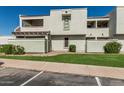 Charming exterior view of a home with a well-maintained lawn and sidewalks at 850 S River Dr # 2065, Tempe, AZ 85281