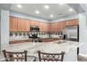 Spacious kitchen with stainless steel appliances, granite countertops, and ample cabinetry at 10359 E Jacob Ave, Mesa, AZ 85209