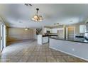 Spacious living room with tile flooring and lots of natural light at 10524 W Pima St, Tolleson, AZ 85353