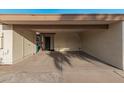 Spacious carport offering covered parking with convenient access to the front door at 13237 N 25Th Dr, Phoenix, AZ 85029
