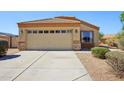 Charming single-level home featuring a two-car garage and low-maintenance landscaping at 14822 N Tonya Cir, El Mirage, AZ 85335