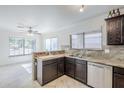 Kitchen with granite countertops, stainless steel appliances and open concept layout at 3351 W Via Del Sol Dr, Phoenix, AZ 85027
