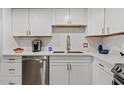 Updated kitchen with stainless steel appliances and white cabinets is ready for the next home chef at 7920 E Camelback Rd # 508, Scottsdale, AZ 85251