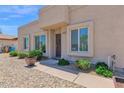 Inviting front entrance with manicured landscaping and stone ground cover leading to a cozy home at 3919 E Larkspur Dr, Phoenix, AZ 85032