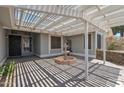 Inviting covered courtyard with a decorative fountain and tiled flooring at 4812 W Butler Dr, Chandler, AZ 85226