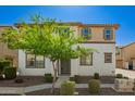 Inviting two-story home with well-manicured landscaping, enhancing curb appeal in a tranquil setting at 503 N Ranger Trl, Gilbert, AZ 85234