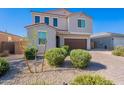 Charming two-story home boasts desert landscaping and inviting curb appeal at 1744 W Hopi Dr, Coolidge, AZ 85128