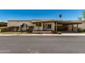 Single-story home with a front yard, a carport, and desert landscaping at 6025 N 10Th Pl, Phoenix, AZ 85014