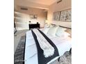 Inviting bedroom featuring a comfortable bed, stylish decor, and soft lighting at 7151 E Rancho Vista Dr # 6002, Scottsdale, AZ 85251