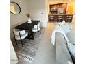 Comfortable dining area and kitchen featuring modern furnishings and stainless steel appliances at 7151 E Rancho Vista Dr # 6002, Scottsdale, AZ 85251