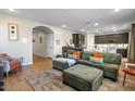 Open-concept space with kitchen, living and dining areas at 880 S 150Th Dr, Goodyear, AZ 85338