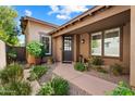 Inviting home entrance with manicured landscaping and a stylish front door at 9262 E Desert Park Dr, Scottsdale, AZ 85255