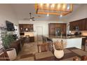 Spacious kitchen featuring granite countertops, stainless steel appliances, custom cabinets, and a charming breakfast nook at 10029 S 44Th St, Phoenix, AZ 85044