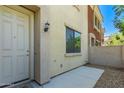 Inviting entryway featuring a neutral color palette and classic outdoor sconce at 125 N Sunvalley Blvd # 119, Mesa, AZ 85207