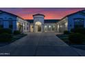 Beautiful home with a unique turret entrance and ample driveway space at 20115 E Sonoqui E Blvd, Queen Creek, AZ 85142