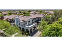 Beautiful, two-story home showcasing its tile roof and landscaped surroundings in a desirable neighborhood at 20437 W White Rock Rd, Buckeye, AZ 85396