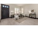 Bright living room featuring new floors, lots of light, and contemporary furniture at 2461 E Stephens Pl, Chandler, AZ 85225