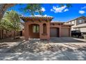 Inviting single-story home with a private two-car garage and low-maintenance desert landscaping at 3850 E Geronimo St, Gilbert, AZ 85295