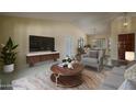 Inviting living room with neutral tones, modern furnishings, and ample natural light at 6101 E Beck Ln, Scottsdale, AZ 85254