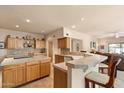 Spacious kitchen boasts ample counter space, tile flooring, and a convenient breakfast bar at 12642 N Mountainside Dr # D, Fountain Hills, AZ 85268