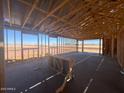 Unfinished interior framing with views of the open landscape at 16190 W Bajada Rd, Surprise, AZ 85387