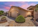 Charming home featuring a spacious driveway, desert landscaping, and a welcoming entrance at 2069 E Winchester Way, Chandler, AZ 85286