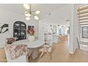 Elegant dining area with modern light fixture and open floor plan at 312 E Windsor Ave # 6, Phoenix, AZ 85004