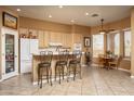 Bright eat-in kitchen area with stainless appliances and backyard view at 8698 E Preserve Way, Scottsdale, AZ 85266