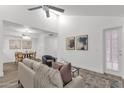 Open living area with a dining set and modern decor that creates a stylish and comfortable space at 1075 E Chandler Blvd # 212, Chandler, AZ 85225