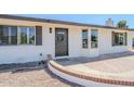 Charming home featuring a decorative door and landscaping at 2337 E Contessa St, Mesa, AZ 85213