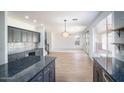 Modern kitchen features sleek countertops, stainless steel appliances, and an open-concept design at 6014 W Oberlin Way, Phoenix, AZ 85083