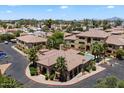 A captivating aerial view of a resort-style apartment community, complete with lush landscaping and a sparkling pool at 2134 E Broadway Rd # 2031, Tempe, AZ 85282