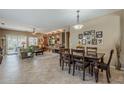 Open-concept living and dining area filled with natural light and modern finishes at 549 E Quentin Ln, San Tan Valley, AZ 85140