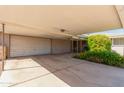 Covered carport provides ample parking space and convenient access to the home's entrance at 6009 W Medlock Dr, Glendale, AZ 85301