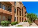 Exterior of a multi-story apartment building with balconies, offering modern living spaces at 14575 W Mountain View Blvd # 12309, Surprise, AZ 85374