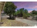Backyard featuring a secure fence offering a private and tranquil outdoor space at 19102 N 91St St, Scottsdale, AZ 85255