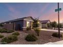 Street view showcasing desert landscaping, well maintained homes and community appeal near 195th Drive at 19531 W Palo Verde Dr, Litchfield Park, AZ 85340