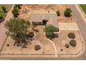 Inviting single-story home featuring a neutral color palette, desert landscaping, and a charming walkway at 22201 E Vallejo St, Queen Creek, AZ 85142