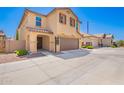 Charming two-story home with a two-car garage, landscaped with desert rock and easy care shrubs at 5113 E Greenway E St, Mesa, AZ 85205