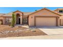 Charming single-story home with desert landscaping and a welcoming entrance at 15226 S 14Th Dr, Phoenix, AZ 85045