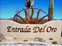 Decorative Entrada Del Oro community sign surrounded by desert landscaping at 18198 E El Viejo Desierto --, Gold Canyon, AZ 85118