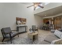 Bright living room with high ceilings, modern furniture, and an open floor plan at 205 N 74Th St # 261, Mesa, AZ 85207