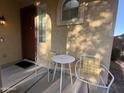 Inviting front patio area with seating, perfect for enjoying the outdoors at 7321 S 48Th Dr, Laveen, AZ 85339