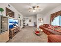 Open-concept living room featuring neutral walls and plush carpeting at 7401 W Arrowhead Club Dr # 2067, Glendale, AZ 85308